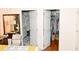 The main bedroom has two doors, one leads to the bathroom and the other to a walk-in closet at 12406 Beacontree Way, Orlando, FL 32837