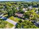 Aerial view of a charming home with well-manicured lawn surrounded by a property line at 1250 Tangerine Ct, Eustis, FL 32726