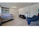 Neutral bedroom with carpet floors, interior access, and a minimalist design at 1250 Tangerine Ct, Eustis, FL 32726