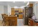 Charming kitchen with wooden cabinetry and modern appliances at 1250 Tangerine Ct, Eustis, FL 32726