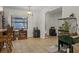 Cozy living room with adjacent kitchen area and tile flooring at 1250 Tangerine Ct, Eustis, FL 32726