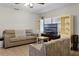 Cozy living room with comfortable seating and tile flooring at 1250 Tangerine Ct, Eustis, FL 32726