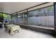 Enclosed patio featuring a table with chairs and backyard views at 1250 Tangerine Ct, Eustis, FL 32726