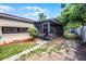 Cozy sunroom with access to the yard, enhancing the property's appeal at 1250 Tangerine Ct, Eustis, FL 32726