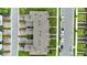 A birds-eye-view of a townhome community showcasing meticulous landscaping and well-organized street layout at 13293 Pontoon Rd, Winter Garden, FL 34787