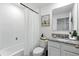 Bright bathroom featuring a tub with shower, granite countertops, and modern fixtures at 13293 Pontoon Rd, Winter Garden, FL 34787