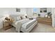 Serene bedroom with a plush bed, soft neutral tones, and a bright window view at 13293 Pontoon Rd, Winter Garden, FL 34787