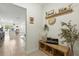 Inviting entryway with stylish decor, a bench, and an open view into the main living area at 13293 Pontoon Rd, Winter Garden, FL 34787