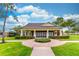 Charming clubhouse with manicured lawn and landscaping, perfect for community events at 1356 Scarlet Oak Loop, Winter Garden, FL 34787