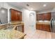 Beautiful kitchen with granite countertops, stainless steel appliances, and ample cabinet space at 1356 Scarlet Oak Loop, Winter Garden, FL 34787