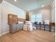 Versatile living space with hardwood floors, ample natural light, and potential for customized furniture arrangements at 13617 Haulover Beach Ln, Orlando, FL 32827