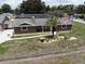 Aerial view of home, showcasing landscaping and fence at 13785 Se 39Th Ter, Summerfield, FL 34491