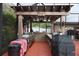 Outdoor kitchen with high-end grill and bar seating at 13785 Se 39Th Ter, Summerfield, FL 34491