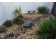 Secluded Zen garden with rock features, stone bench, and lush greenery at 13785 Se 39Th Ter, Summerfield, FL 34491