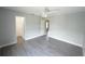 Spacious bedroom features a ceiling fan and neutral tones at 14308 Abington Heights Dr, Orlando, FL 32828