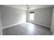 Bedroom with hard floors, neutral walls, and a ceiling fan at 14308 Abington Heights Dr, Orlando, FL 32828