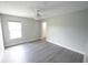 Bright bedroom with natural light and ceiling fan at 14308 Abington Heights Dr, Orlando, FL 32828