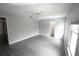 Spacious bedroom has a ceiling fan and closet at 14308 Abington Heights Dr, Orlando, FL 32828