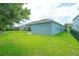 Spacious backyard with manicured lawn, ideal for outdoor activities at 1529 Chelsea Manor Cir, Deland, FL 32724