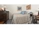 Cozy bedroom featuring a comfortable bed, dresser, and tasteful decor at 1529 Chelsea Manor Cir, Deland, FL 32724