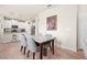 Elegant dining area with modern table, chairs, and decorative wall art at 1529 Chelsea Manor Cir, Deland, FL 32724