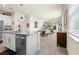 Modern kitchen with a large island, stainless steel appliances, and open floor plan at 1529 Chelsea Manor Cir, Deland, FL 32724