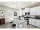 Bright kitchen with a breakfast bar and stainless steel appliances at 1529 Chelsea Manor Cir, Deland, FL 32724