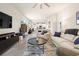 Spacious living room featuring neutral walls, comfortable seating, and an open layout at 1529 Chelsea Manor Cir, Deland, FL 32724