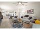 Spacious living room featuring neutral walls, comfortable seating, and an open layout at 1529 Chelsea Manor Cir, Deland, FL 32724