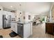 Bright and airy open-concept living space with kitchen, dining and living areas at 1529 Chelsea Manor Cir, Deland, FL 32724