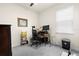 Office space with desk, chair, computer, and a light-filled window at 1529 Chelsea Manor Cir, Deland, FL 32724