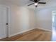 An empty bedroom features wood floors and a ceiling fan at 1801 Palm Ln, Orlando, FL 32803