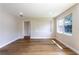 Bright living room with light wood flooring and lots of natural light at 1801 Palm Ln, Orlando, FL 32803