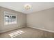 Bedroom featuring carpet floors, and a window bringing in natural light at 1815 Big Oak Ln, Kissimmee, FL 34746