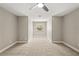 Spacious bedroom with neutral walls, carpet, a ceiling fan, and a window at 1815 Big Oak Ln, Kissimmee, FL 34746