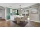 Cozy dining area with stylish decor, access to the backyard, and convenient bar area at 1821 Geigel Ave, Orlando, FL 32806