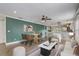 Bright living room featuring stylish furnishings and an open floor plan into the kitchen at 1821 Geigel Ave, Orlando, FL 32806