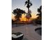 Backyard deck with sunset view overlooking the lake at 1865 S Tanner Ct, Deltona, FL 32738