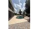 Backyard pool featuring a screened patio, scenic views, and lush tropical landscaping at 1865 S Tanner Ct, Deltona, FL 32738