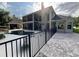 Spacious backyard featuring a pool, patio, and screened-in porch perfect for outdoor entertaining at 1865 S Tanner Ct, Deltona, FL 32738