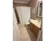 Bathroom with a shower/tub combo and neutral colored tiles at 1865 S Tanner Ct, Deltona, FL 32738