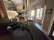 Dining room with open floor plan, large windows, lake views and lots of natural light at 1865 S Tanner Ct, Deltona, FL 32738