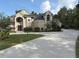 Exterior of a beautiful two-story home with well-manicured landscaping at 1865 S Tanner Ct, Deltona, FL 32738