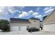 Attached garage with multi-car capacity and convenient access to the main house at 1865 S Tanner Ct, Deltona, FL 32738