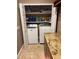 Bright laundry area features washer, dryer, and granite countertops, and convenient in-closet storage at 1865 S Tanner Ct, Deltona, FL 32738