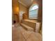 Stunning bathroom featuring a deep soaking tub with tiled accents and a separate shower at 1865 S Tanner Ct, Deltona, FL 32738