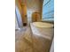 Stunning bathroom featuring a deep soaking tub with tiled accents and a separate shower at 1865 S Tanner Ct, Deltona, FL 32738