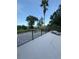 Outdoor patio area offers a relaxing space with a view of the lake at 1865 S Tanner Ct, Deltona, FL 32738