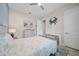 Well-lit bedroom featuring beach themed decor and a comfortable atmosphere at 1962 Flora Pass Pl, Kissimmee, FL 34747