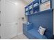 Well-organized mudroom with blue cabinets and storage, a functional space for keeping things tidy at 1962 Flora Pass Pl, Kissimmee, FL 34747
